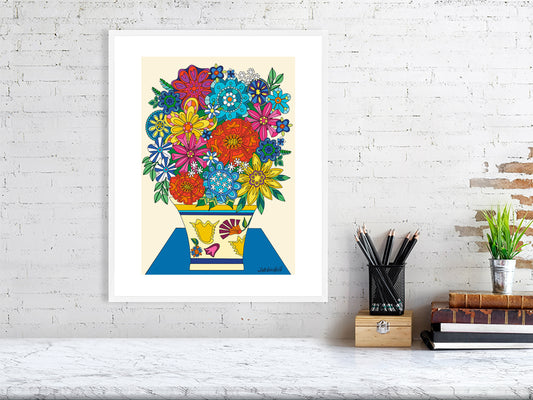 Colorful floral artwork on a white brick wall above a desk.