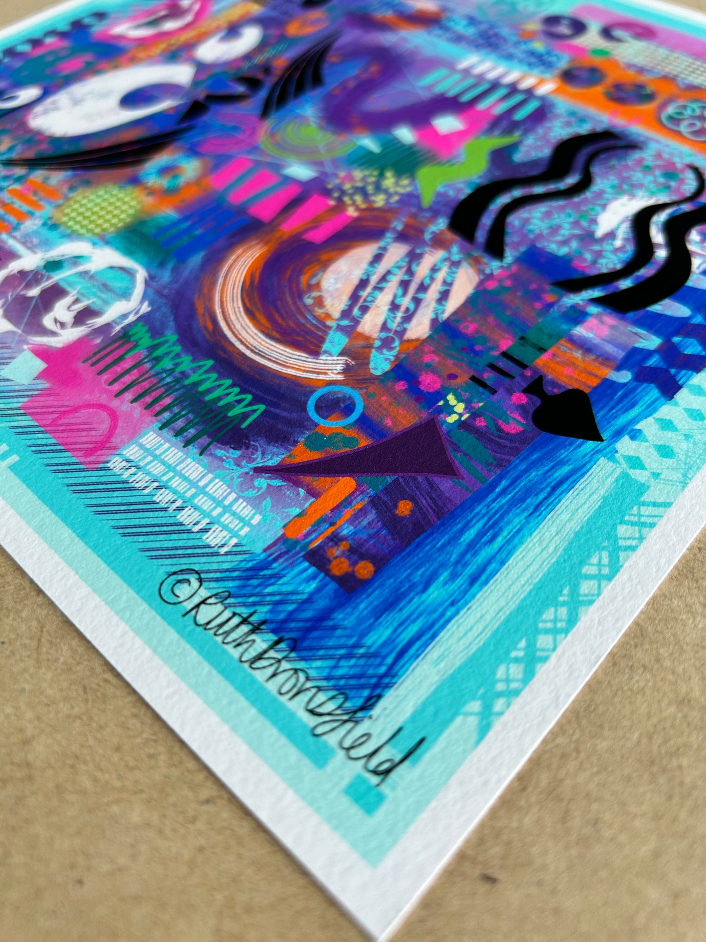 A close-up photo of one corner of this contemporary abstract art print by Ruth Dronsfield
