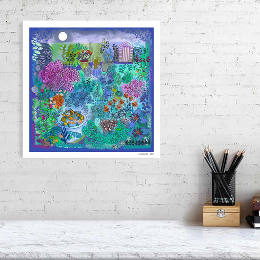 Colourful stylised garden themed artwork by Uk artist Ruth Dronsfield. Shades of purple, green and pinks with colourful details and intricate line work. Plant, shed, moon and hedgehog features. Shown unframed against a white brick wall above a desk with stationary