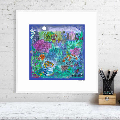Colorful stylised garden themed artwork by Ruth Dronsfield in white frame on a white wall above a desk with stationery items. Artwork in shades of purple, green, pinks with colourful  plant, shed, moon and hedgehog details.