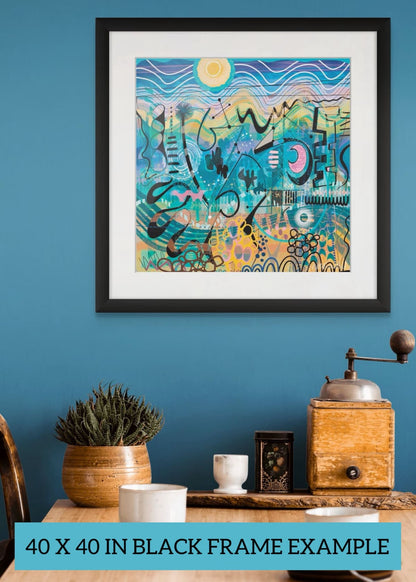 'Seashore Dance' giclee art print by UK artist Ruth Dronsfield shown framed in black on a teal blue wall above a dining table